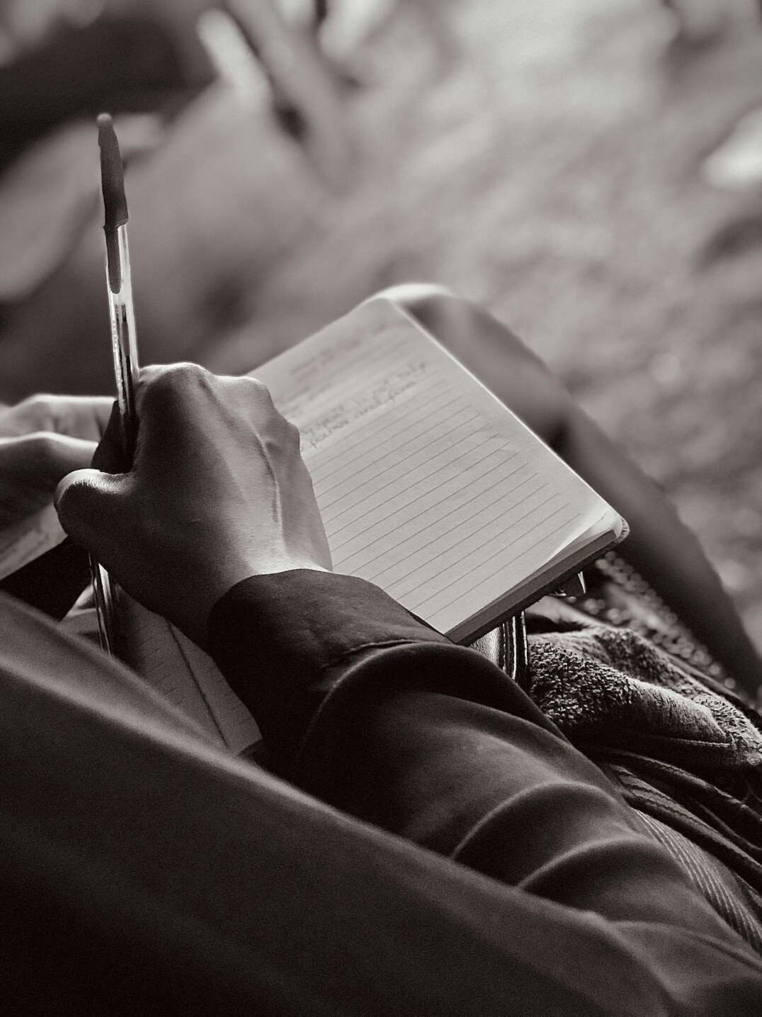 person journaling thoughts